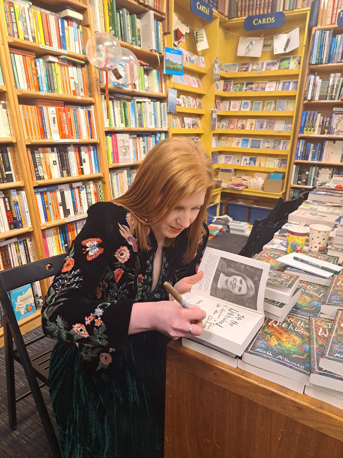 Meabh signing books